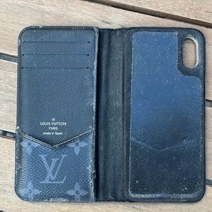 Authentic Louis Vuitton cell phone cover/wallet. Black